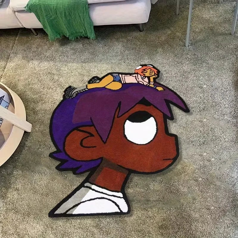 A plush cartoon character rug featuring a purple-haired figure with orange hair and yellow clothing on a gray carpet.