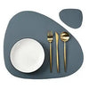 A set of reusable vinyl placemats featuring a dark gray plate and silverware on a matching gray background.
