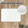 White rounded perimeter doormat placed on a wooden floor with a circular detail shown.