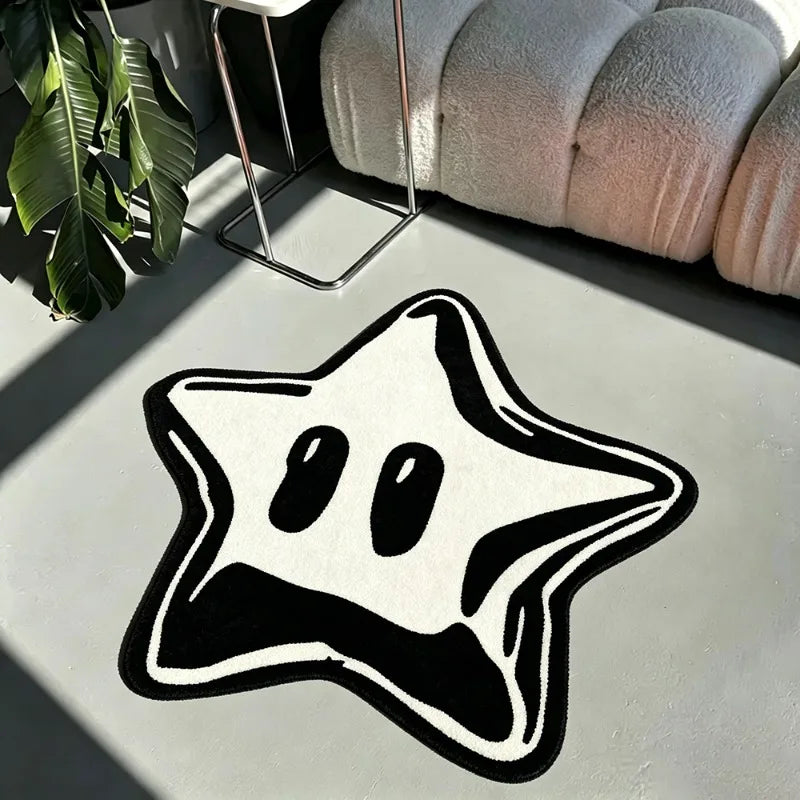 A black pentagram rug is displayed on a light surface next to a potted plant and a textured cushion.