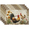 A set of vintage farmhouse rooster placemats featuring detailed illustrations of roosters and floral patterns.