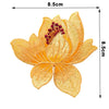 Yellow embroidered flower patch with a central cluster of purple stamens on a white background.