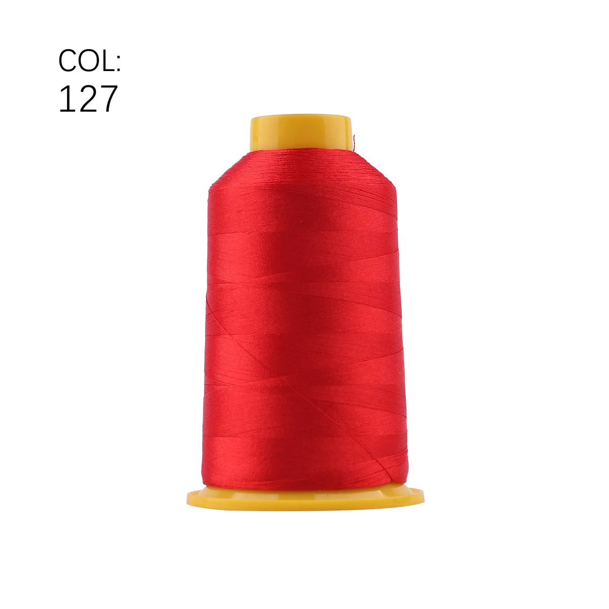 A spool of red embroidery thread with a yellow core and plastic base.