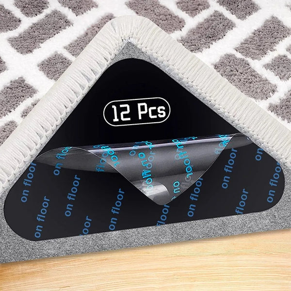 A triangular product display showing twelve reusable anti-slip carpet and mat grippers on a gray mat.