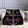 Black printed flannel travel blanket featuring various musical icons and text