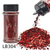 A glass jar of red glitter and a hand pouring the same red holographic craft nail glitter mix onto a surface.