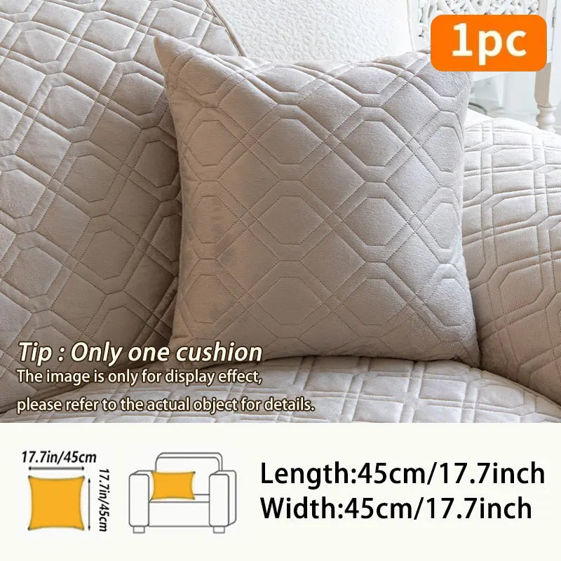 A single beige quilted sofa cushion cover displayed on a white sofa fabric.