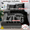 A set of black and grey bedding includes three pieces: two pillowcases and a duvet cover.