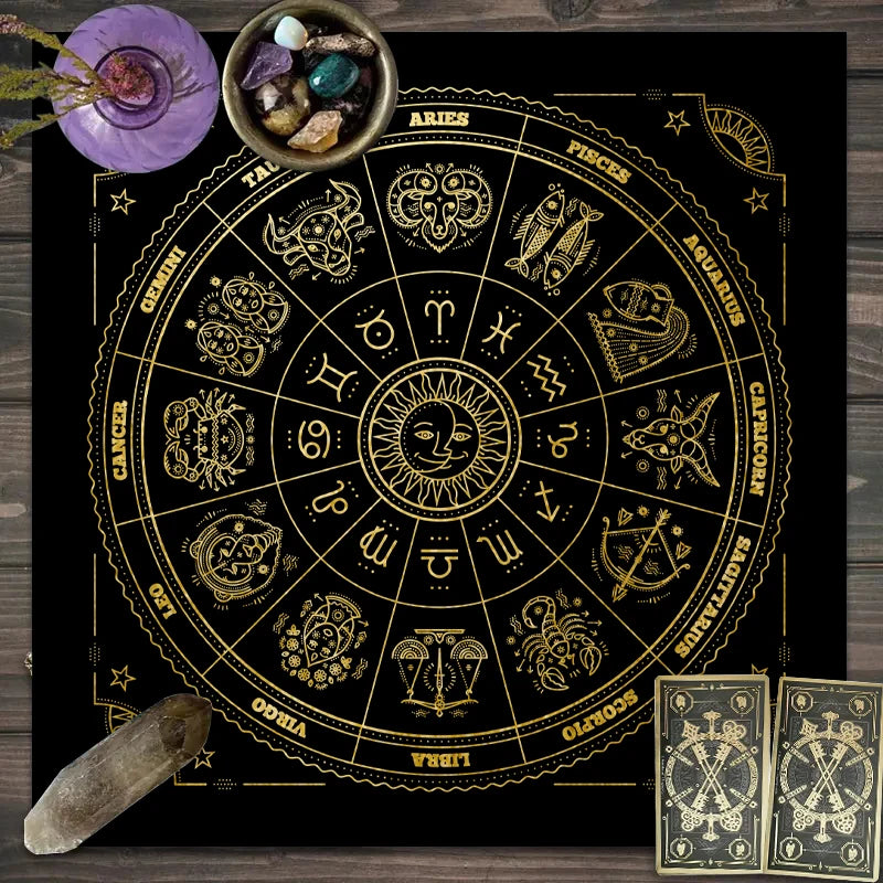 A circular gold-on-black tarot chart with twelve zodiac signs and planetary symbols, surrounded by a purple stone and tarot c