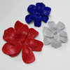 Three rhinestone flower applique patches in blue, red, and silver are displayed on a white background.