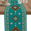 Teal linen table runner with an Indian-inspired geometric pattern featuring brown and white accents.