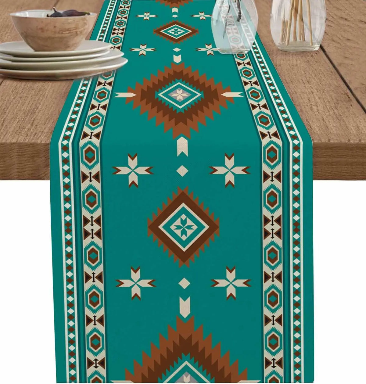 Teal linen table runner with an Indian-inspired geometric pattern featuring brown and white accents.