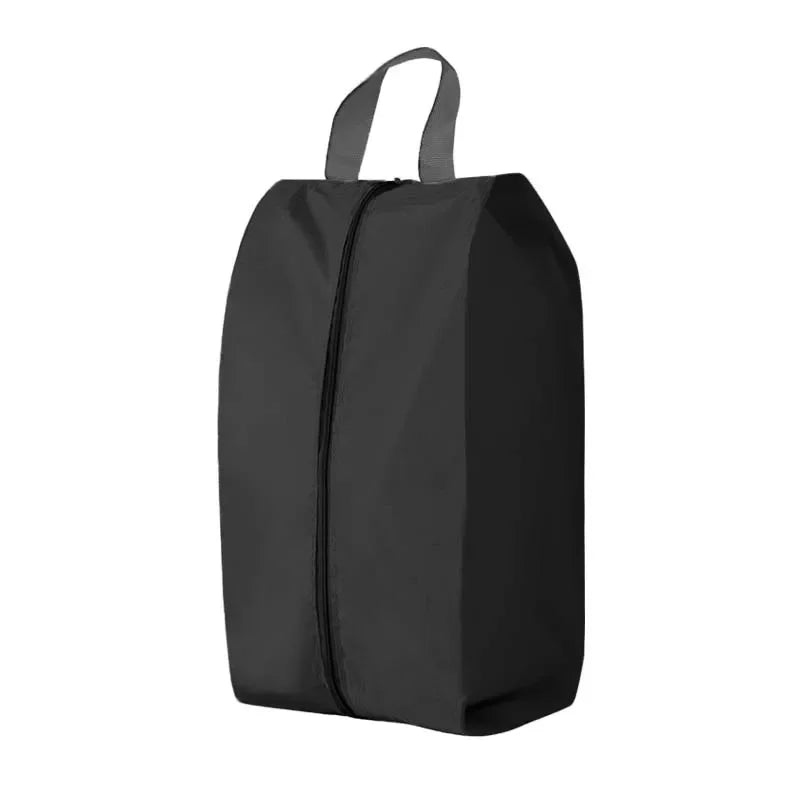 A black durable foldable shoe and travel organizer bag with shoulder straps.
