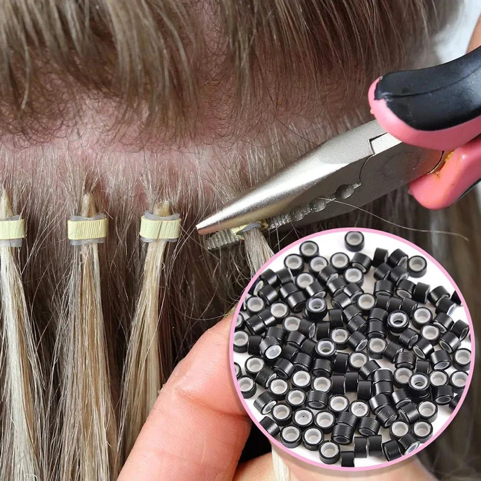 A hand holds a pink tool clamping a hair extension bead tool kit with multiple hair extensions visible.