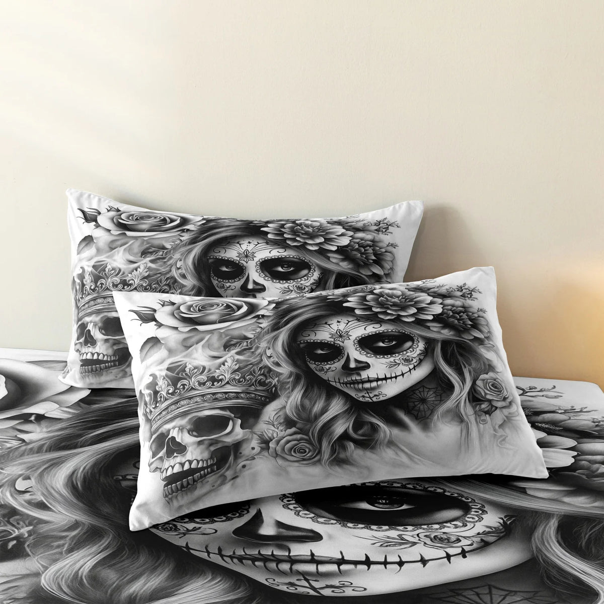 A set of three decorative pillows featuring detailed black and white skulls with floral designs.