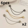 Six pairs of silver and gold magnetic chain buckles used for clothing