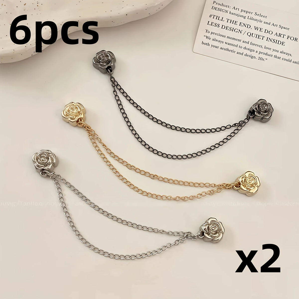 Six pairs of silver and gold magnetic chain buckles used for clothing
