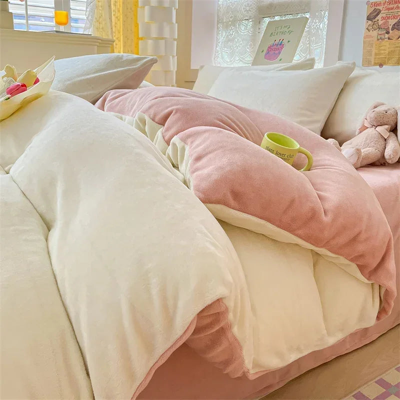 A cozy milk velvet duvet cover set featuring pink and cream colored bedding in a bright bedroom setting.
