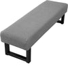 Gray stretch jacquard dining bench cover with a black frame.