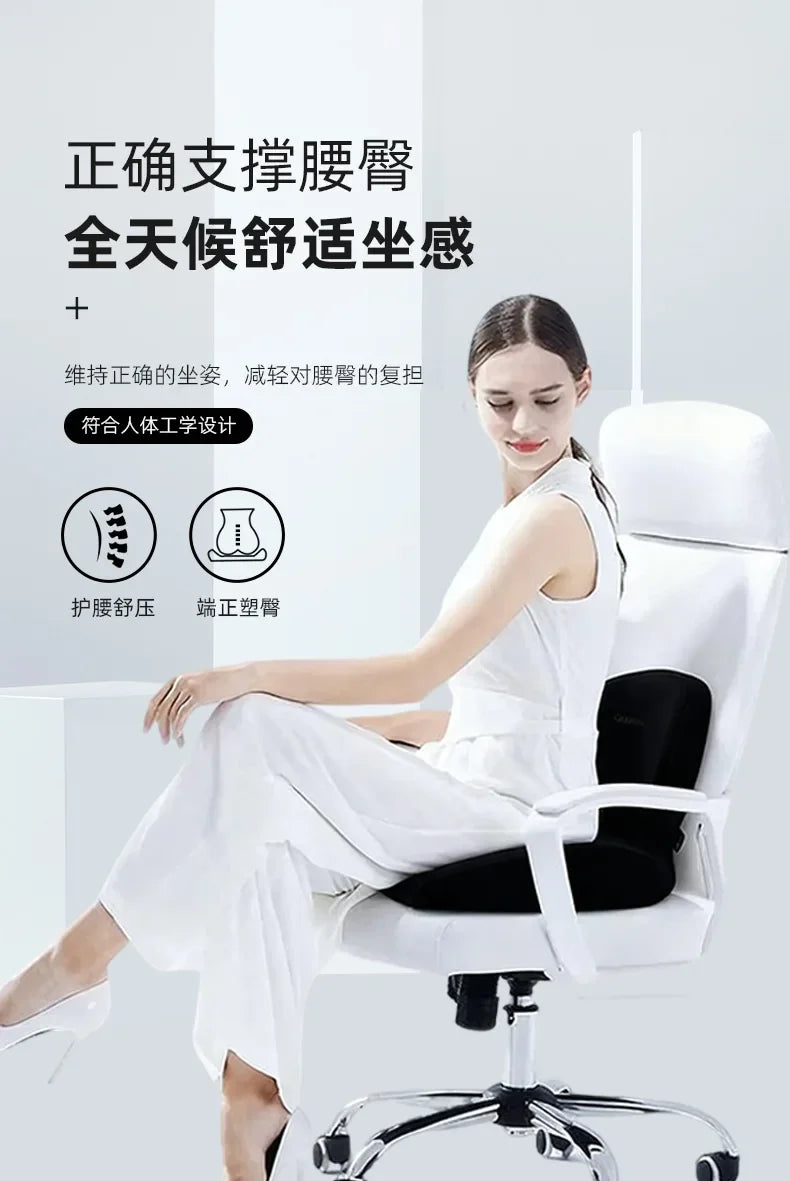 A woman is sitting in a white ergonomic chair, demonstrating the lumbar support cushion.