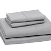 A stack of four gray microfiber flat fitted sheets.