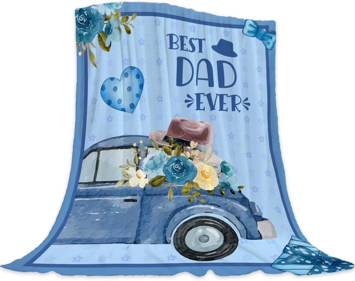 A light blue watercolor blanket featuring a vintage car, flowers, and text that reads Best Dad Ever.