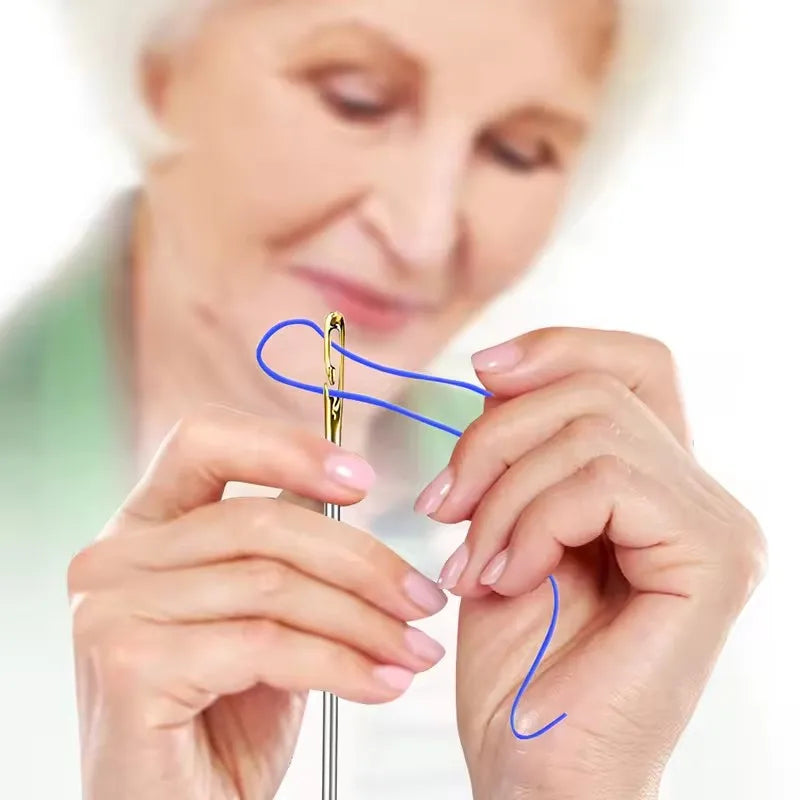 A woman's hands are shown using a stainless steel sewing kit with blue thread and needles.