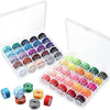 A clear storage case holds a 25-piece set of colorful sewing machine bobbins and various bobbin components.