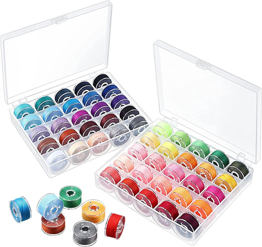 A clear storage case holds a 25-piece set of colorful sewing machine bobbins and various bobbin components.