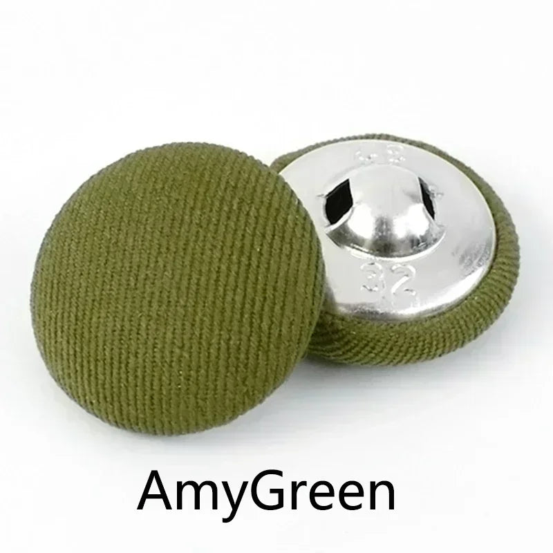 A set of round fabric-covered shank buttons in olive green and silver.