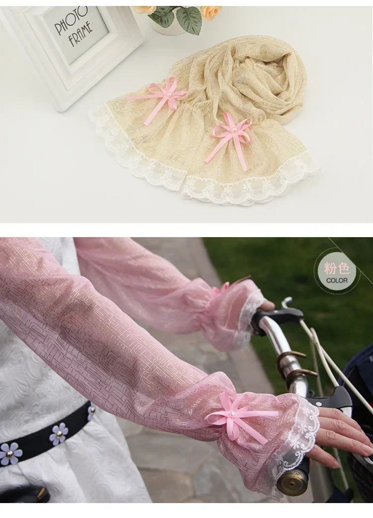 Close-up of a pink sheer fabric sleeve with a delicate pink floral bow detail on the cuff.