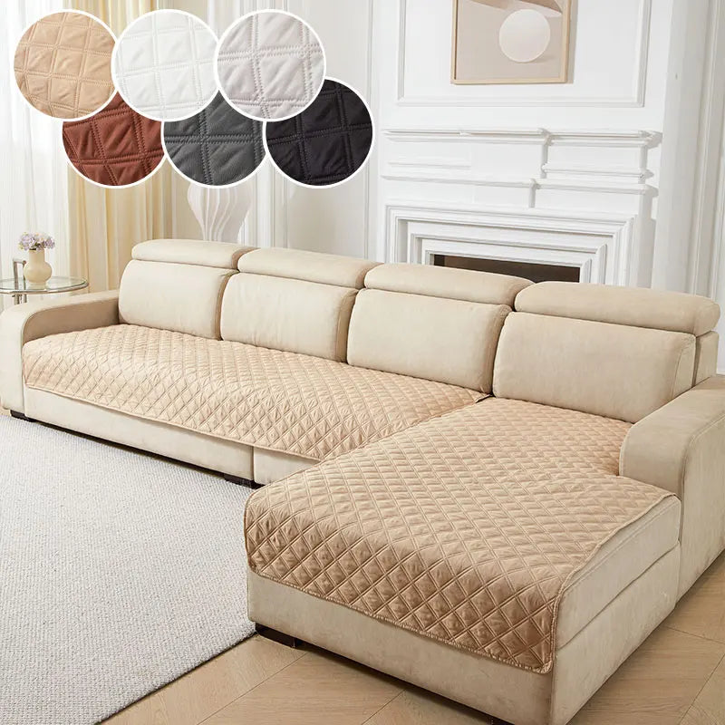 A beige anti-slip sofa cushion cover displayed on a light-colored sofa with decorative round cushions.