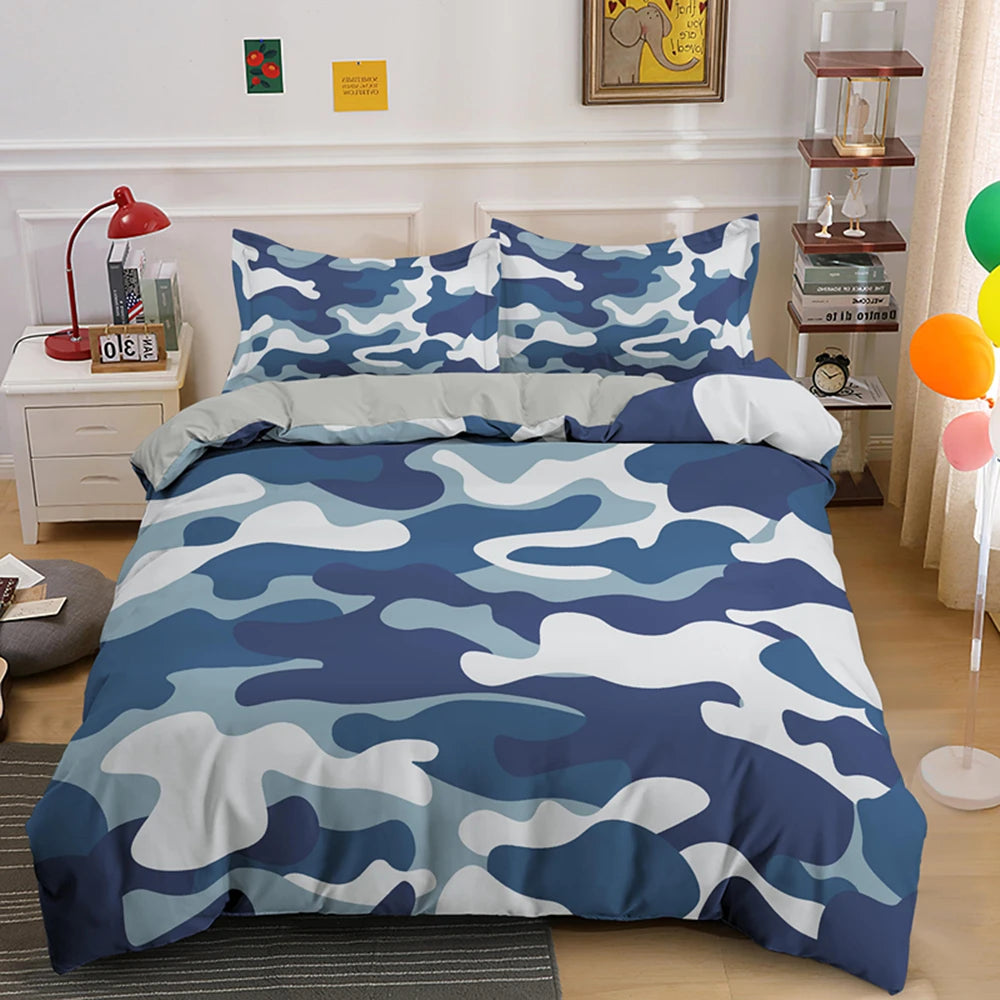 A blue and white camouflage duvet cover set displayed on a bed with surrounding decor.