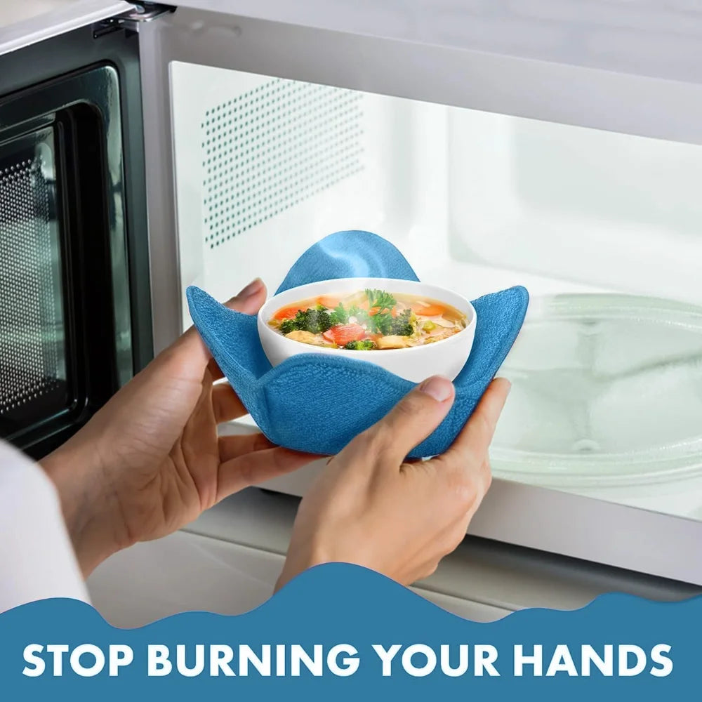 A hand holds a blue quilted microwave bowl cozy insert inside a white microwave oven.