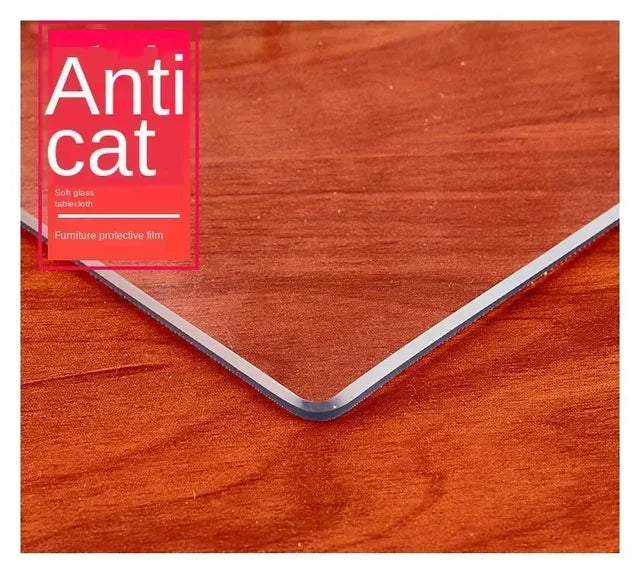 A red silicone film labeled Anticat is placed on a wooden table surface.