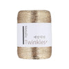 Spool of metallic gold twine or yarn labeled Twinkles for crafting