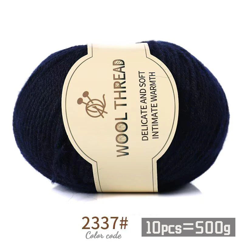 Dark navy wool thread skein with a label indicating the color code and weight per pack