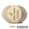 A ball of beige wool thread labeled as Wool Thread Delicate and Soft Intimate Warmth