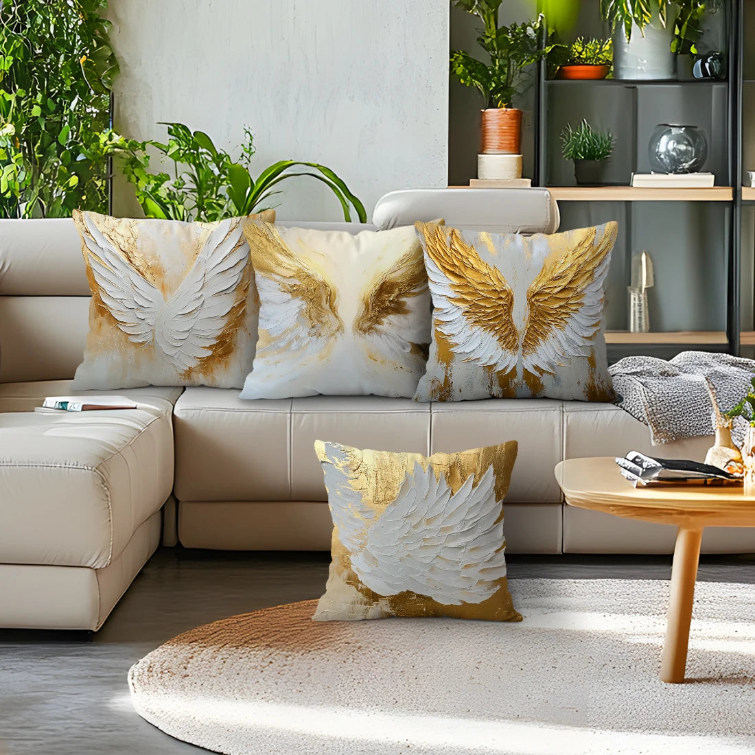 A collection of decorative throw pillows featuring golden and white wing patterns on a light beige sofa.
