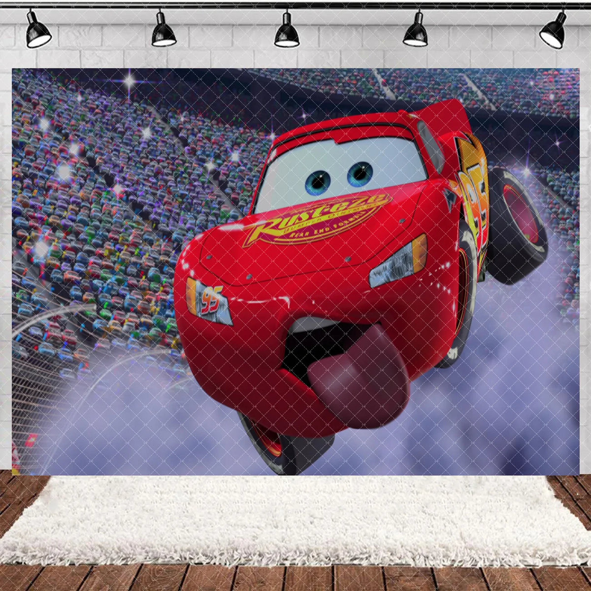 A red cartoon race car flying against a blue sky backdrop for a birthday party.
