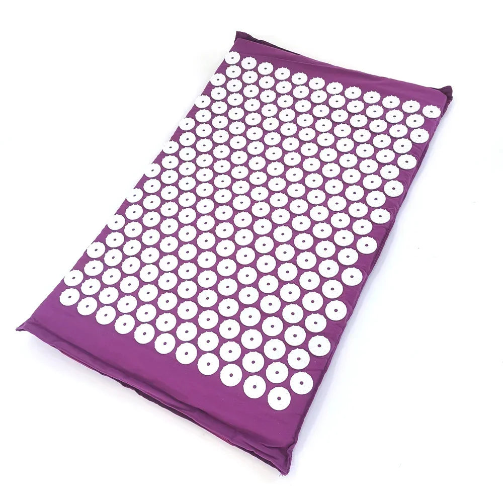Purple acupressure relief mat and pillow set with numerous white acupressure dots