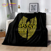 A black flannel throw blanket featuring yellow text with the phrase WU-TANG on it.
