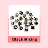 A collection of black mixing instant removable pearl brooch buttons arranged on a white background.