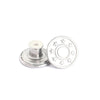 Silver metal buttons with star designs used for denim and clothing