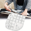 A hand is using an acrylic quilting ruler with corner templates on a sewing surface.