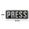 Black and white embroidered press armband patch with hook and loop backing