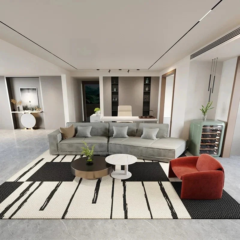 A Scandinavian geometric non-slip area rug featuring black and white stripes in a modern living space.