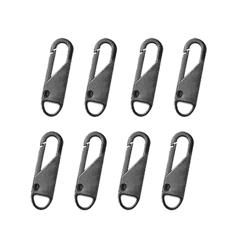 A set of five universal replacement zipper pullers, dark gray or black metal, shown individually.