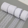 Rolls of white floral lace ribbon cotton trim for sewing and crafts