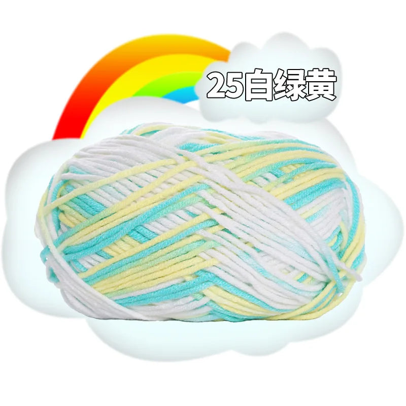 A ball of white and light blue cotton yarn is shown next to a rainbow graphic.